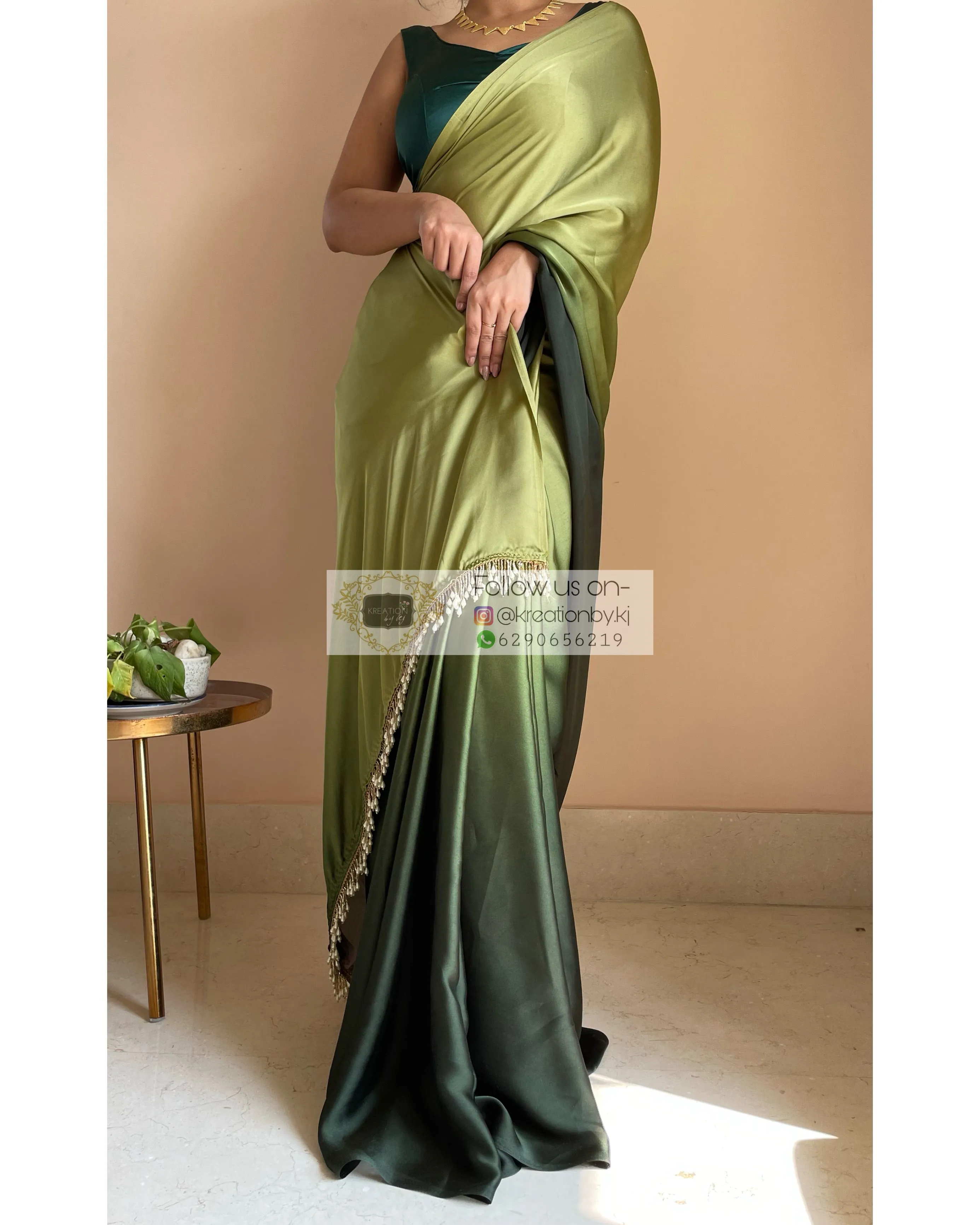 Here is an optimized title for your e-commerce product:

Elegant Kacchi Kairi Ombré Crepe Silk Saree with Intricate Handmade Tassels on Pallu